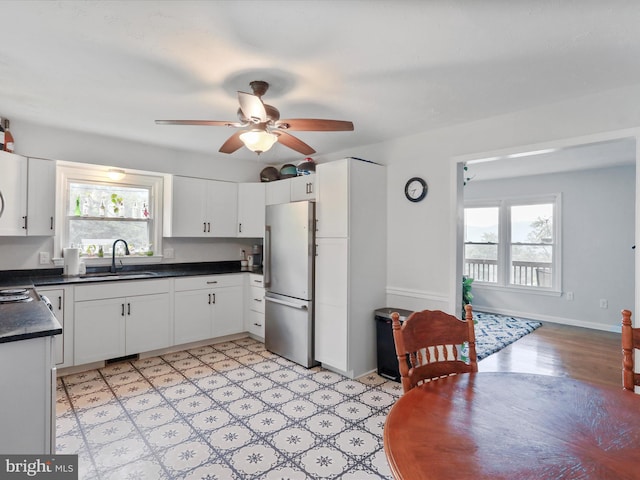 37AND41 Headwaters Rd, Chester Gap, VA 22623 - kitchen with freestanding refrigerator, dark countertops, plenty of natural light, and ceiling fan