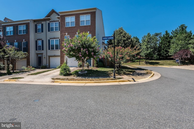 6362 Levtov Lndg, Alexandria, VA 22312 - townhome / multi-family property with concrete driveway and an attached garage