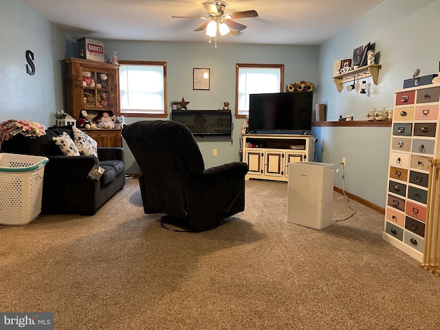 10474 Mapleton Rd, Shippensburg, PA 17257 - carpeted living area with healthy amount of natural light and a ceiling fan