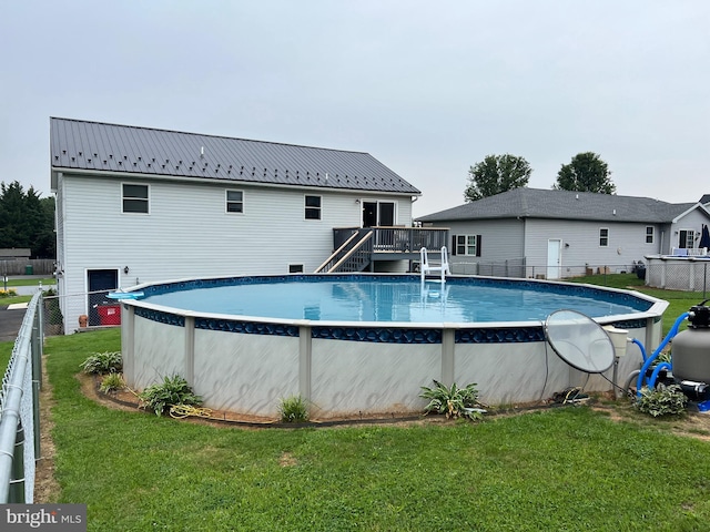 10474 Mapleton Rd, Shippensburg, PA 17257 - view of swimming pool with a wooden deck, stairs, and a fenced backyard