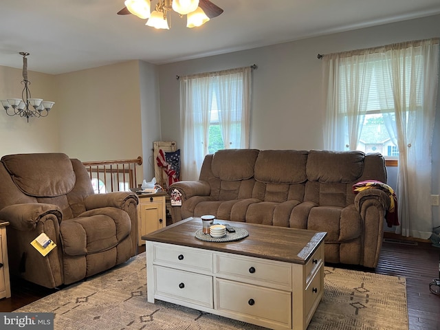 10474 Mapleton Rd, Shippensburg, PA 17257 - living area featuring ceiling fan, wood finished floors, plenty of natural light, and a chandelier