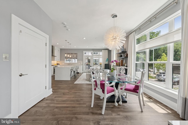 11336 Emerald Park Rd, Potomac, MD 20854 - dining area with dark wood-style floors and recessed lighting
