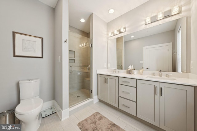 11336 Emerald Park Rd, Potomac, MD 20854 - bathroom featuring double vanity, a shower stall, and tile patterned flooring