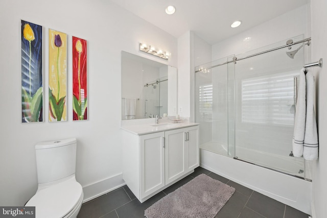 11336 Emerald Park Rd, Potomac, MD 20854 - bathroom with vanity, shower / bath combination with glass door, tile patterned floors, and recessed lighting