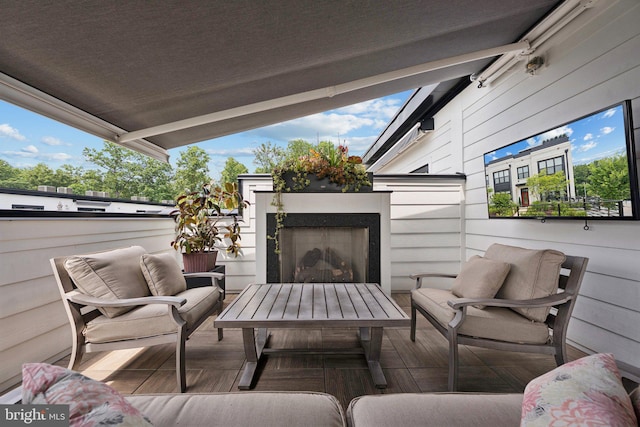 11336 Emerald Park Rd, Potomac, MD 20854 - view of patio / terrace with an outdoor living space with a fireplace