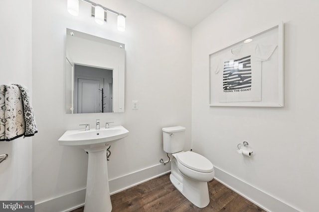 11336 Emerald Park Rd, Potomac, MD 20854 - bathroom with toilet and wood finished floors