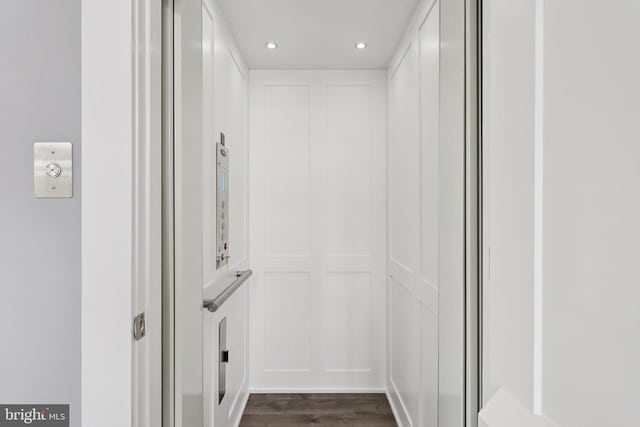 11336 Emerald Park Rd, Potomac, MD 20854 - elevator with wood finished floors and recessed lighting