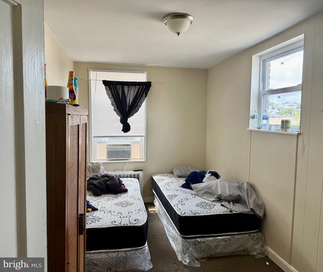 6858 Marshall Rd, Upper Darby, PA 19082 - bedroom with radiator heating unit, carpet, and cooling unit