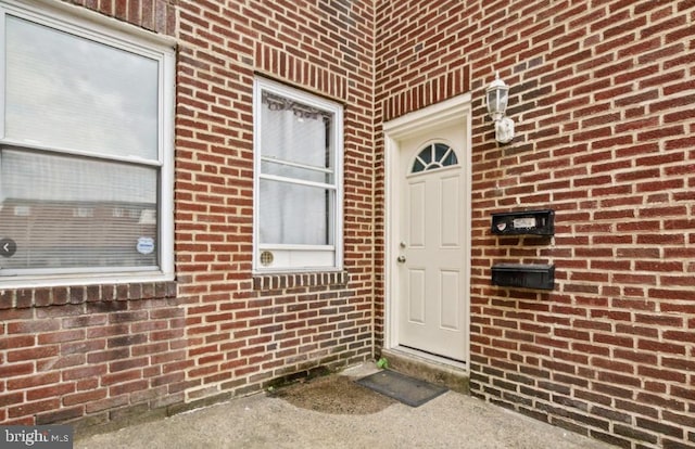 6858 Marshall Rd, Upper Darby, PA 19082 - view of exterior entry featuring brick siding