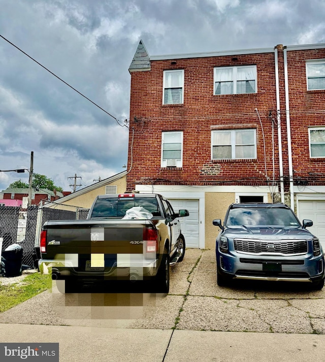 6858 Marshall Rd, Upper Darby, PA 19082 - view of front of house with a garage and driveway