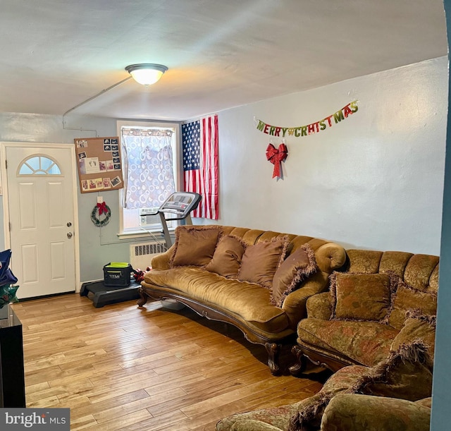6858 Marshall Rd, Upper Darby, PA 19082 - living room featuring radiator heating unit and light wood finished floors