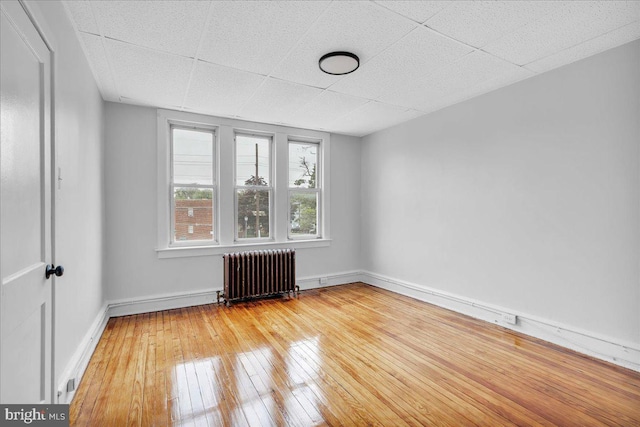 1528 Park Blvd, Camden, NJ 08103 - unfurnished room featuring radiator heating unit and hardwood / wood-style floors