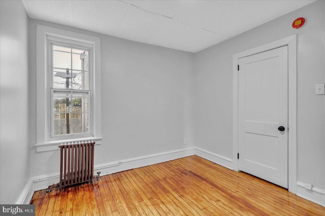 1528 Park Blvd, Camden, NJ 08103 - empty room featuring radiator heating unit and wood finished floors