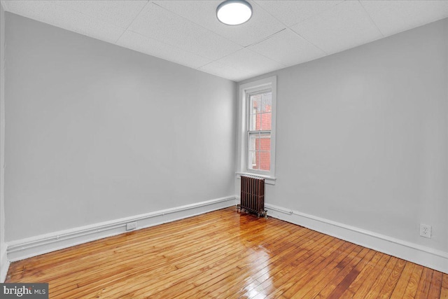 1528 Park Blvd, Camden, NJ 08103 - empty room featuring radiator heating unit and wood-type flooring