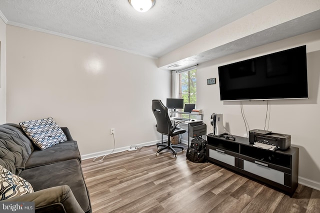 7702 Hanover Pkwy Unit 301, Greenbelt, MD 20770 - office area featuring a textured ceiling, wood finished floors, and ornamental molding
