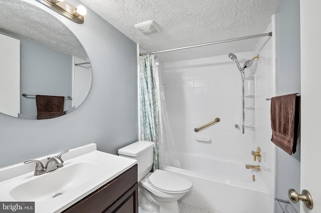 7702 Hanover Pkwy Unit 301, Greenbelt, MD 20770 - full bathroom featuring shower / bathtub combination with curtain, vanity, a textured ceiling, and tile patterned floors