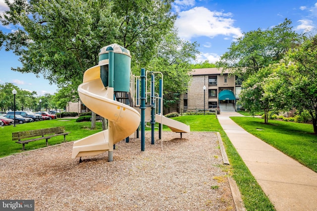 7702 Hanover Pkwy Unit 301, Greenbelt, MD 20770 - community play area featuring a lawn