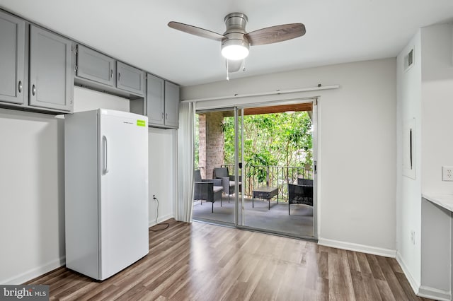 7702 Hanover Pkwy Unit 301, Greenbelt, MD 20770 - dining space featuring wood finished floors and ceiling fan