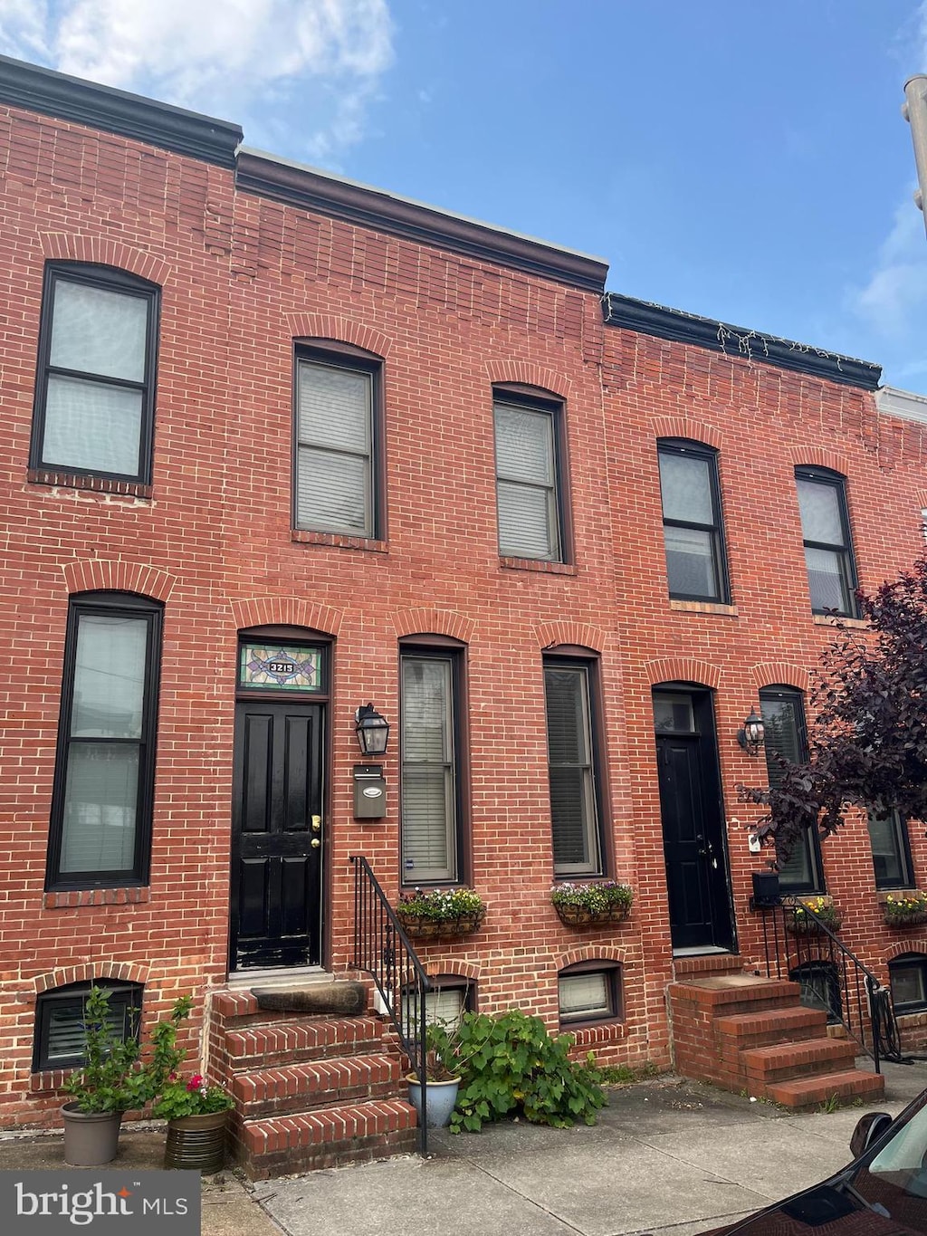 3215 Fleet St, Baltimore, MD 21224 - view of property with brick siding