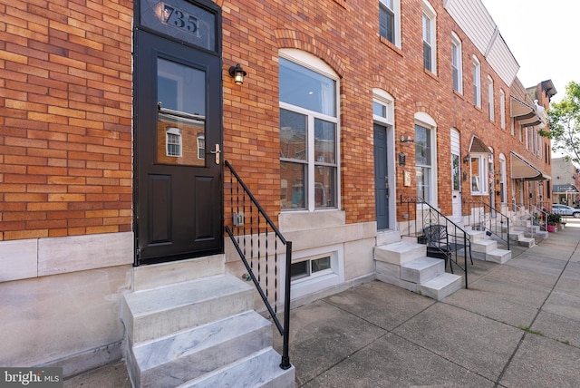 735 S Decker Ave, Baltimore, MD 21224 - doorway to property with brick siding