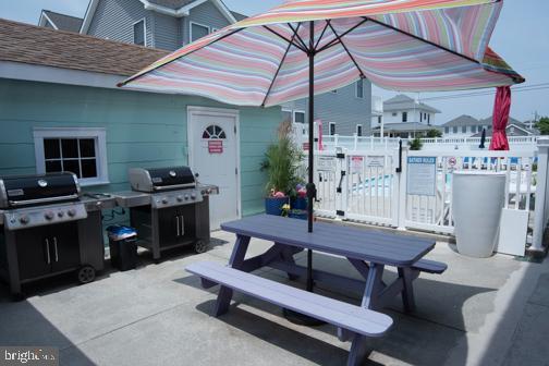 5600 Seaview Ave, Wildwood Crest, NJ 08260 - view of patio / terrace with outdoor dining area and area for grilling
