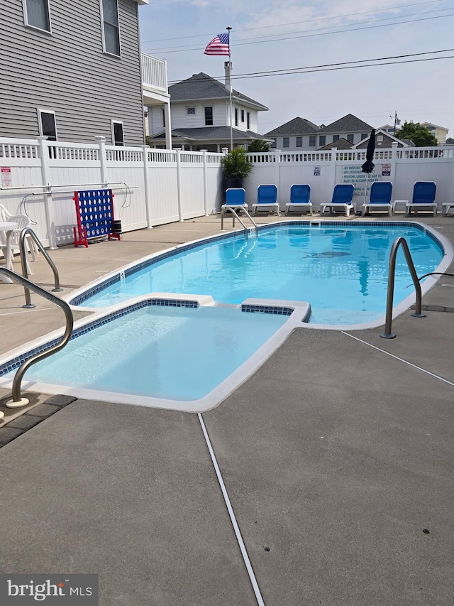 5600 Seaview Ave, Wildwood Crest, NJ 08260 - view of pool featuring a pool with connected hot tub and a patio area