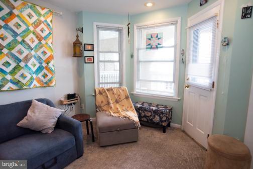 5600 Seaview Ave, Wildwood Crest, NJ 08260 - living area featuring healthy amount of natural light and carpet