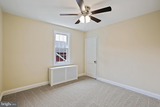 4713 Elsrode Ave, Baltimore, MD 21214 - spare room with radiator heating unit, carpet floors, and ceiling fan