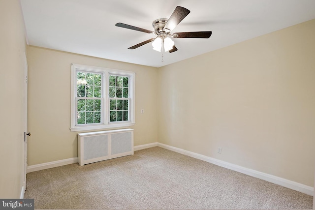 4713 Elsrode Ave, Baltimore, MD 21214 - carpeted spare room featuring radiator heating unit and ceiling fan