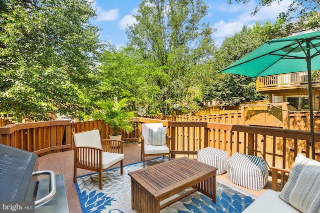 6498 Milva Ln, Springfield, VA 22150 - deck with an outdoor living space and a patio area