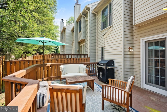 6498 Milva Ln, Springfield, VA 22150 - wooden terrace with an outdoor living space and area for grilling