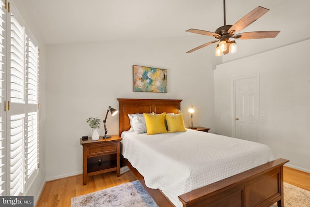 6498 Milva Ln, Springfield, VA 22150 - bedroom with light wood finished floors, vaulted ceiling, and ceiling fan