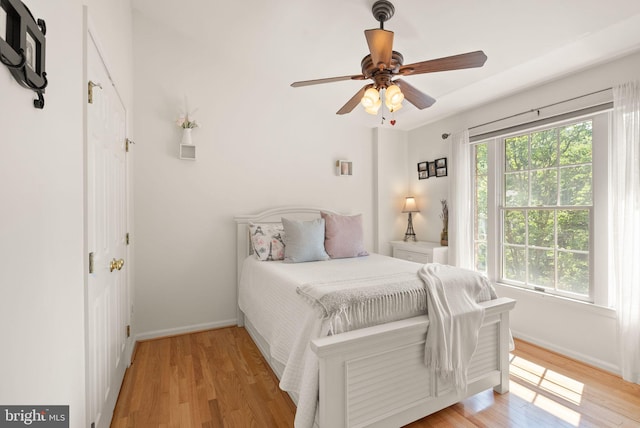 6498 Milva Ln, Springfield, VA 22150 - bedroom featuring light wood-style flooring and a ceiling fan
