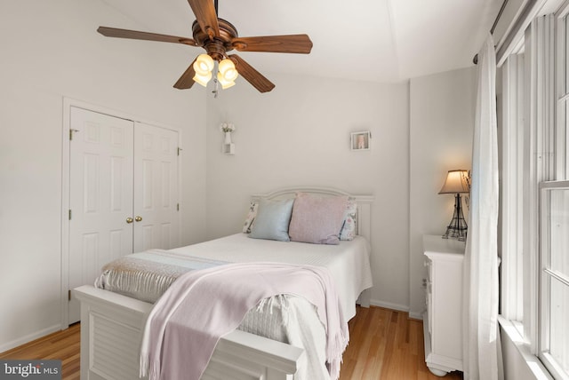 6498 Milva Ln, Springfield, VA 22150 - bedroom with light wood-style floors, a closet, and a ceiling fan