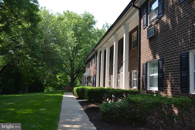 4701 Pennell Rd Unit A-6, Aston, PA 19014 - view of side of home with a yard and brick siding