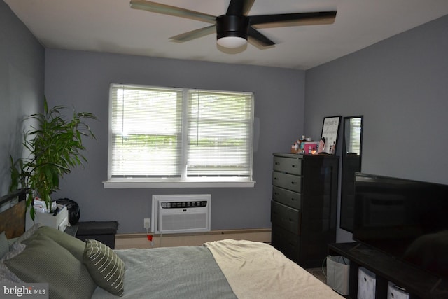 4701 Pennell Rd Unit A-6, Aston, PA 19014 - bedroom with a wall unit AC and ceiling fan
