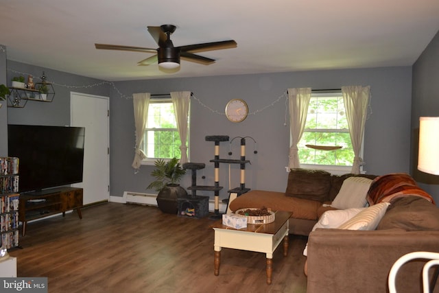 4701 Pennell Rd Unit A-6, Aston, PA 19014 - living room with a baseboard radiator, healthy amount of natural light, wood finished floors, and ceiling fan