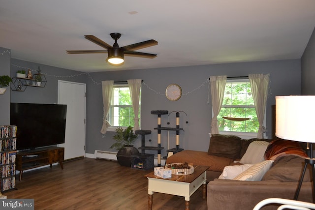 4701 Pennell Rd Unit A-6, Aston, PA 19014 - living room with a ceiling fan, wood finished floors, and baseboard heating