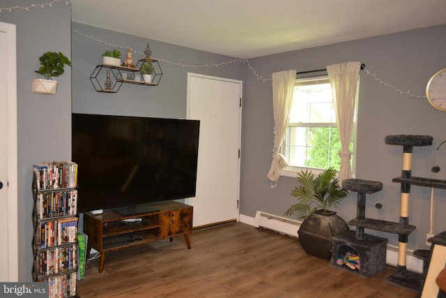 4701 Pennell Rd Unit A-6, Aston, PA 19014 - living area featuring a baseboard heating unit and wood finished floors
