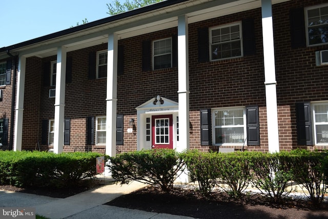 4701 Pennell Rd Unit A-6, Aston, PA 19014 - view of front of house featuring brick siding and a porch
