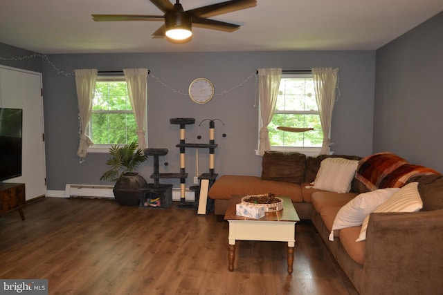 4701 Pennell Rd Unit A-6, Aston, PA 19014 - living area with a baseboard heating unit, wood finished floors, and a ceiling fan