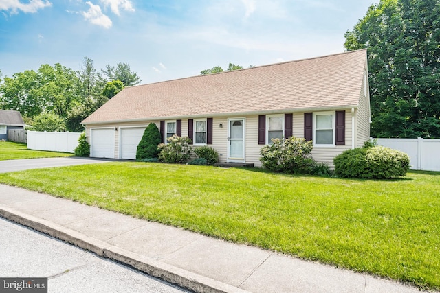 330 N Liberty St, Coopersburg, PA 18036 - view of front of house with driveway, a garage, and a shingled roof