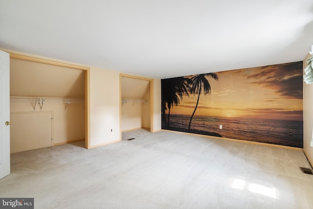 330 N Liberty St, Coopersburg, PA 18036 - unfurnished bedroom featuring two closets and carpet floors