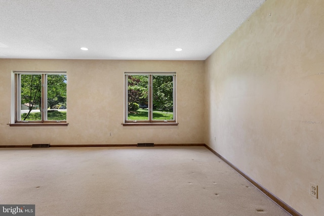 39 Haymarket Ln, Bryn Mawr, PA 19010 - spare room featuring carpet, a textured ceiling, and recessed lighting