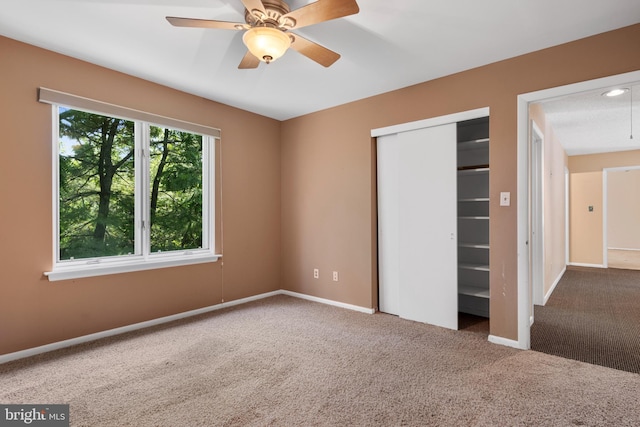 39 Haymarket Ln, Bryn Mawr, PA 19010 - unfurnished bedroom with carpet floors, a closet, and a ceiling fan