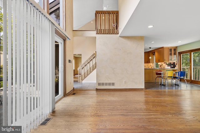39 Haymarket Ln, Bryn Mawr, PA 19010 - entrance foyer with wood finished floors, stairs, and recessed lighting