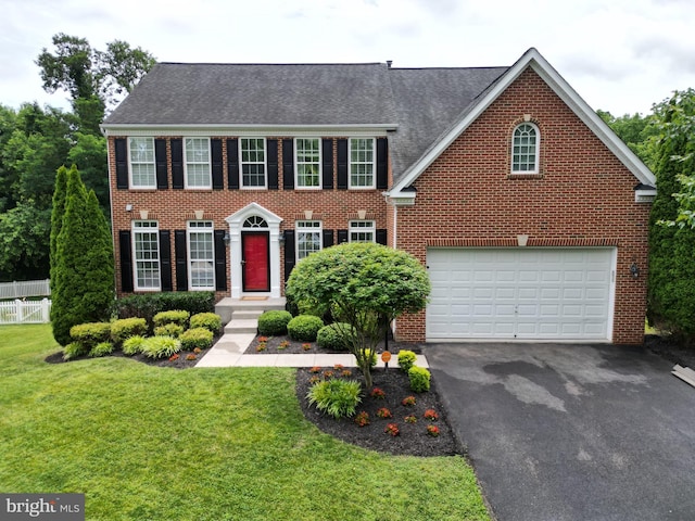 236 Preston Dr, Warrenton, VA 20186 - colonial-style house with brick siding, driveway, a shingled roof, and a garage
