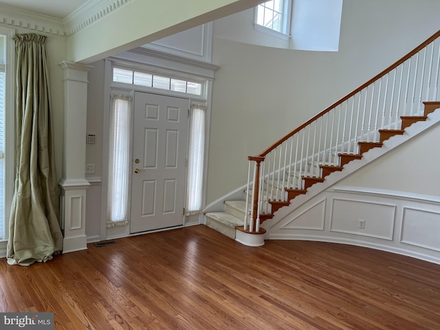 206 Excalibur Dr, Newtown Square, PA 19073 - foyer featuring stairway, wood finished floors, ornamental molding, and a towering ceiling