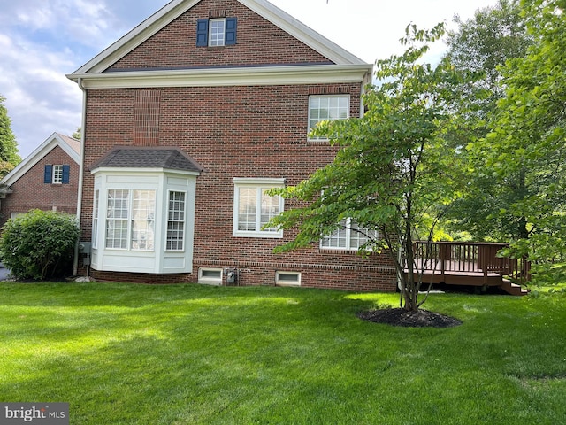 206 Excalibur Dr, Newtown Square, PA 19073 - rear view of house with a yard, brick siding, and a deck