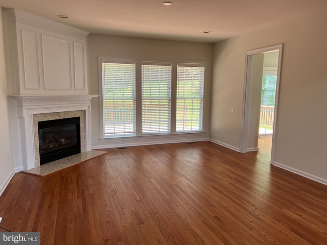 206 Excalibur Dr, Newtown Square, PA 19073 - unfurnished living room featuring a high end fireplace, wood finished floors, and recessed lighting